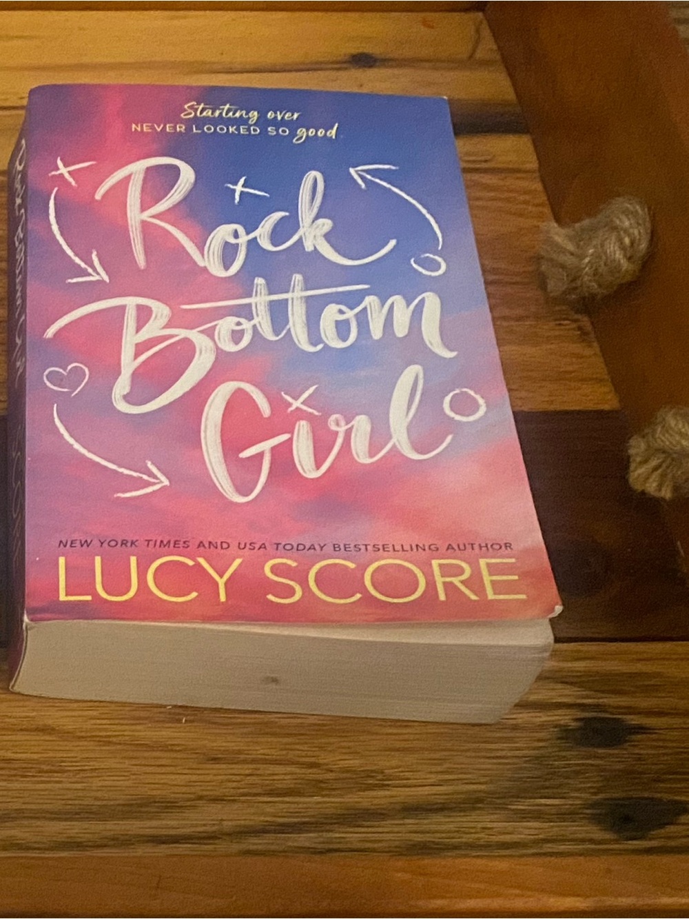 Rock Bottom Girl by Lucy Score paperback book